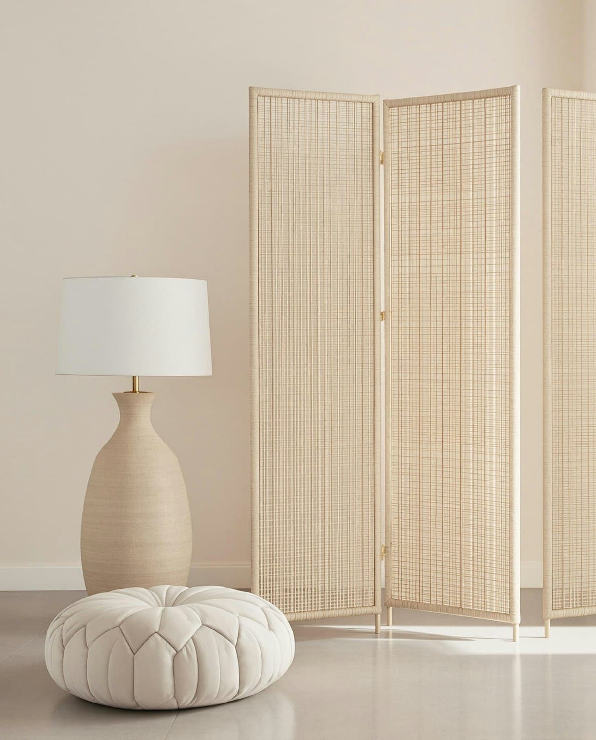 A calm bedroom lit by a warm lamp
